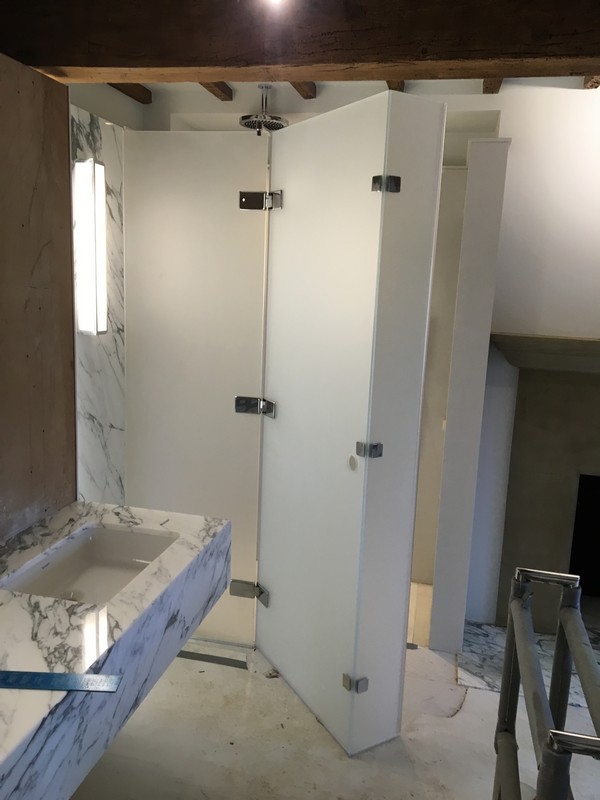 Bespoke frosted glass shower enclosure in Wembley luxury bathroom